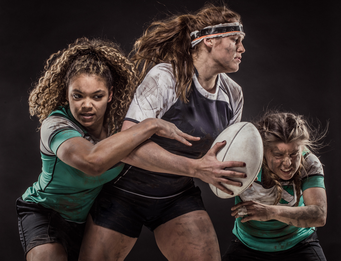 Three Dirty Female Rugby Players
